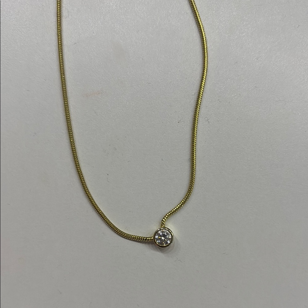 Elegant Gold Necklace with Bezel Crystal Pendant